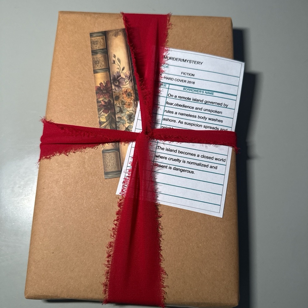 Mystery Book Wrapped in Red Ribbon